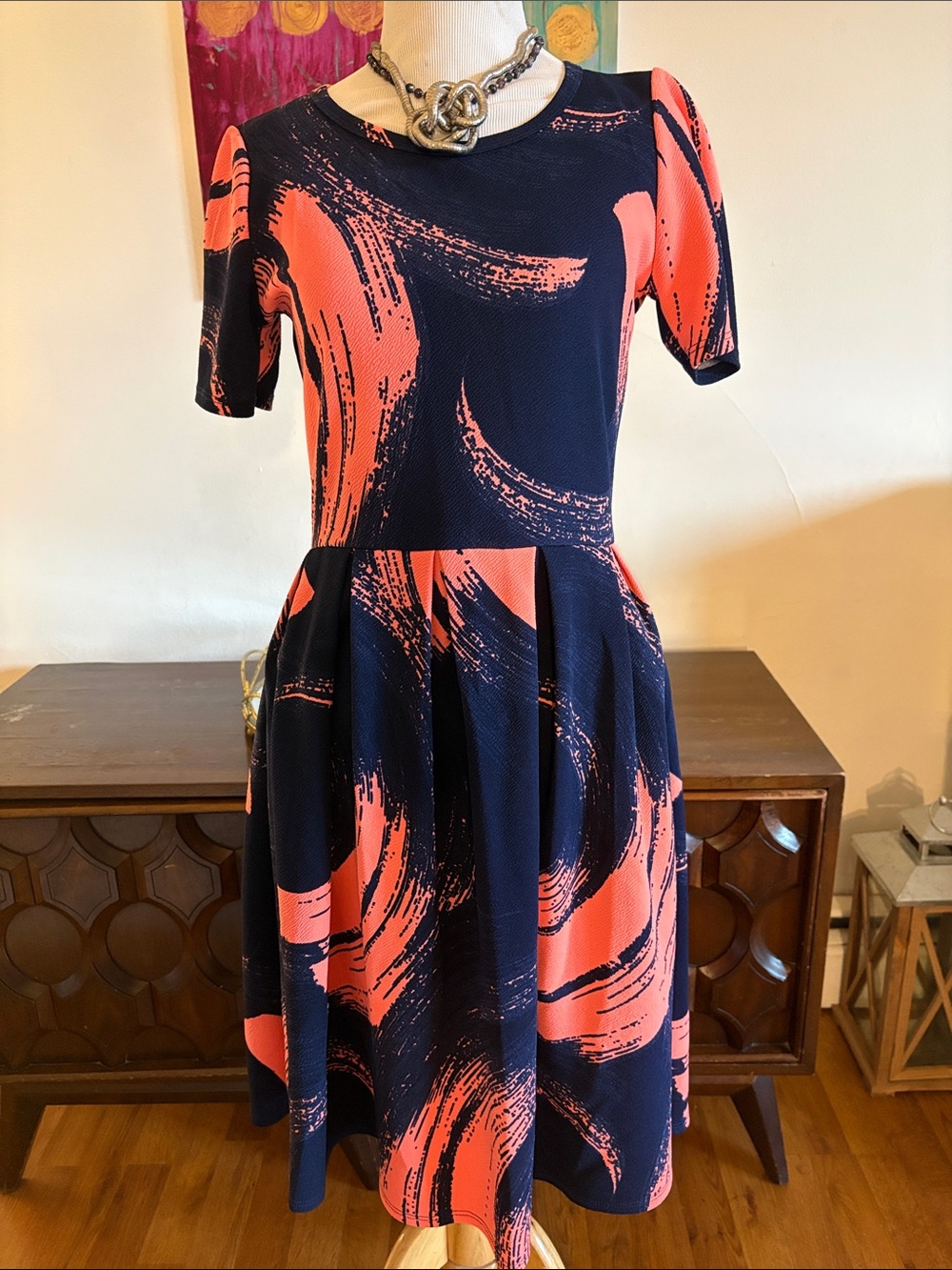 Navy/peach lularoe dress. Zip up with pleats.